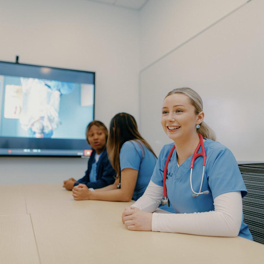 Female nursing student in virtual nursing lab